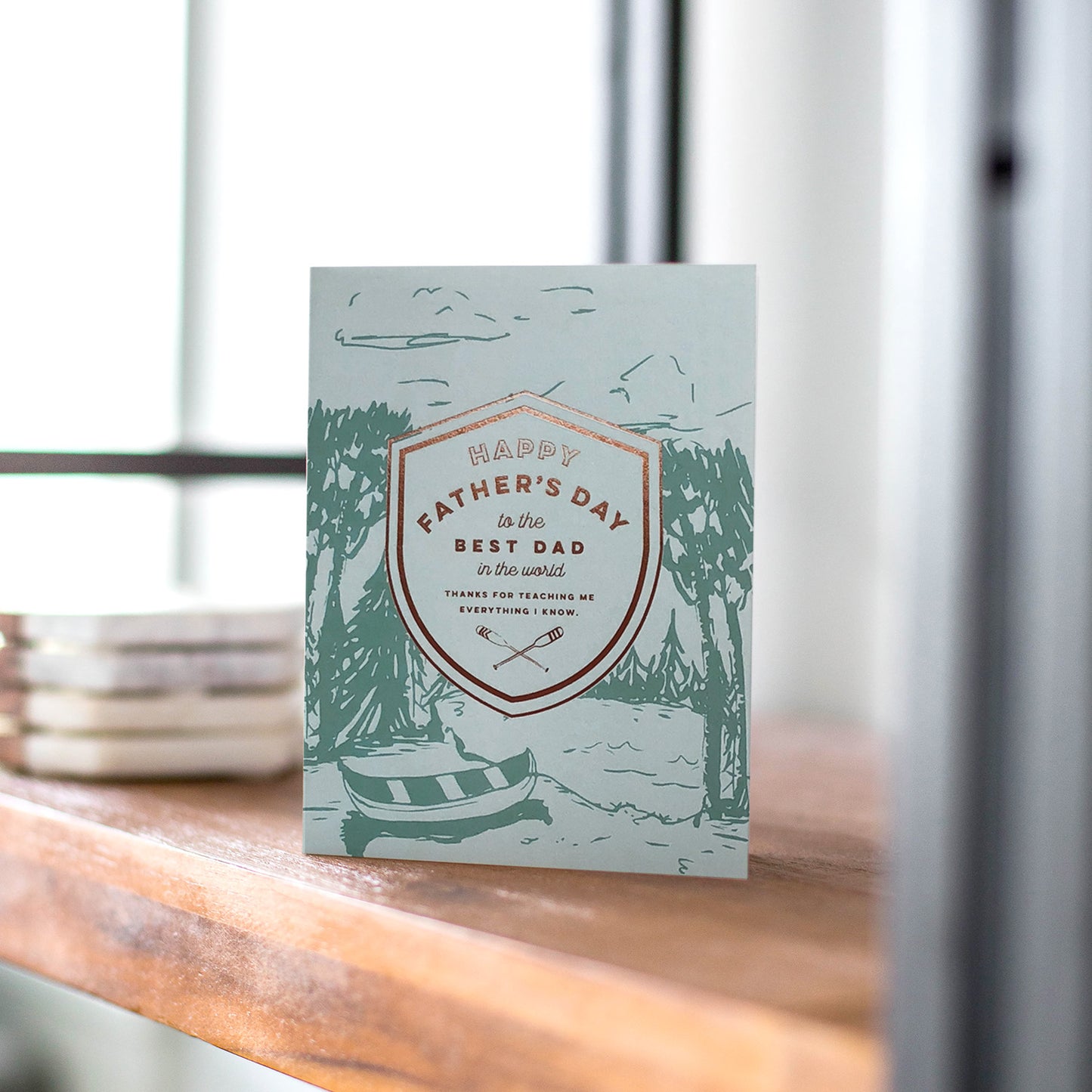 Crest Canoe Father's Day card featuring outdoor adventure, perfect for dads who love canoeing and the outdoors.