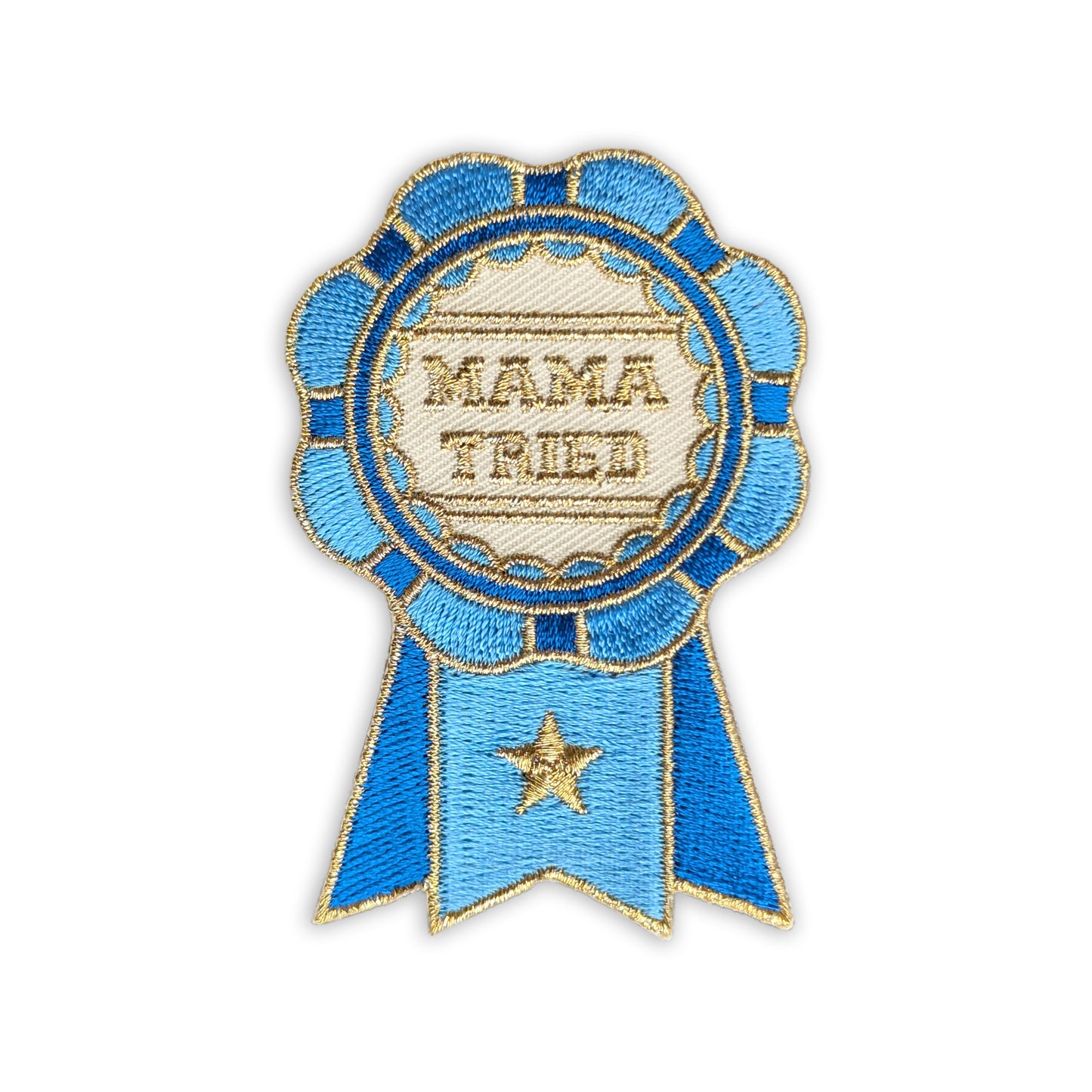 Motivational 'mama tried' embroidered iron-on patch with bright lettering, ideal for customizing planners, notebooks, and clothing, perfect for all the moms out there