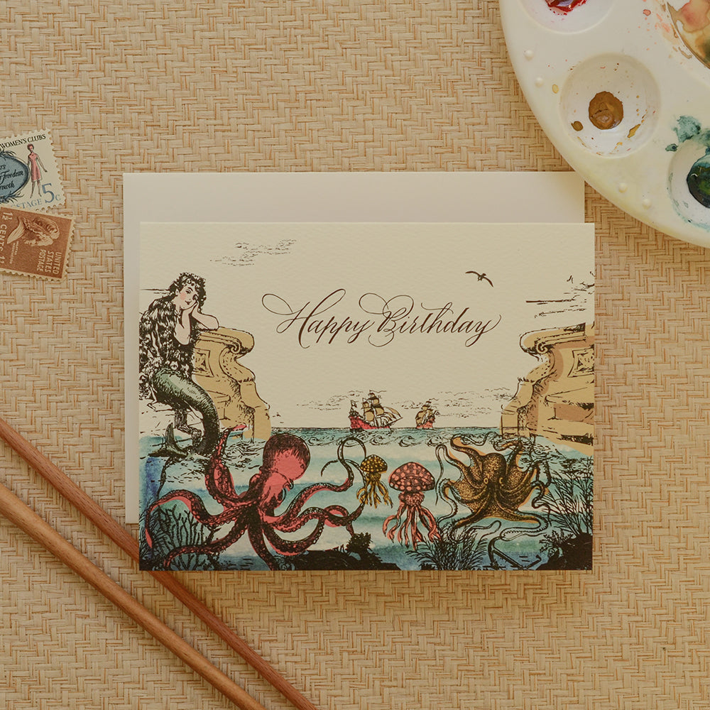 Enchanting birthday card featuring a nautical adventure with waves, sea creatures, and a ship, perfect for those who love the ocean