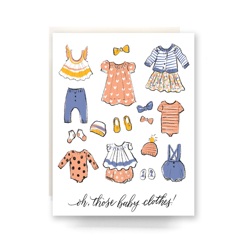 Illustrations of baby clothes in pastel colors on a blank baby shower card.