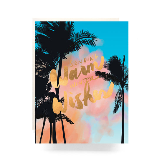 Palms Warm Wishes holiday card with tropical palm tree silhouetted on a sun set sky, great for sending warm holiday greetings, blank inside.