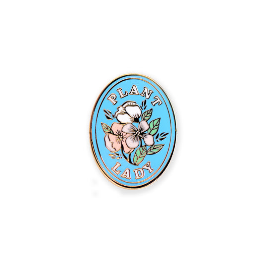 Delicate floral enamel pin with gold accents, perfect for decorating jackets, bags, or stationery items