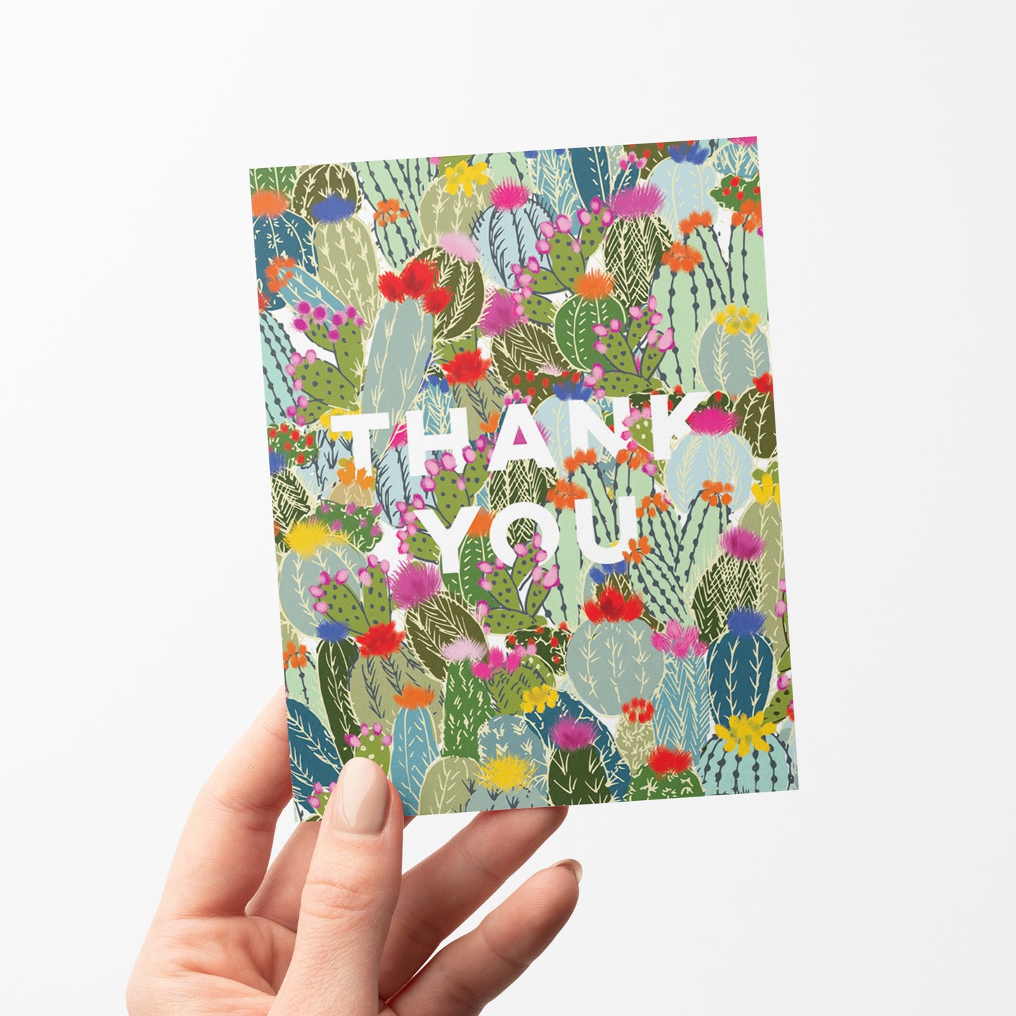 Thank you card with multiple colorful cactus illustrations in a lively pattern and bold type face