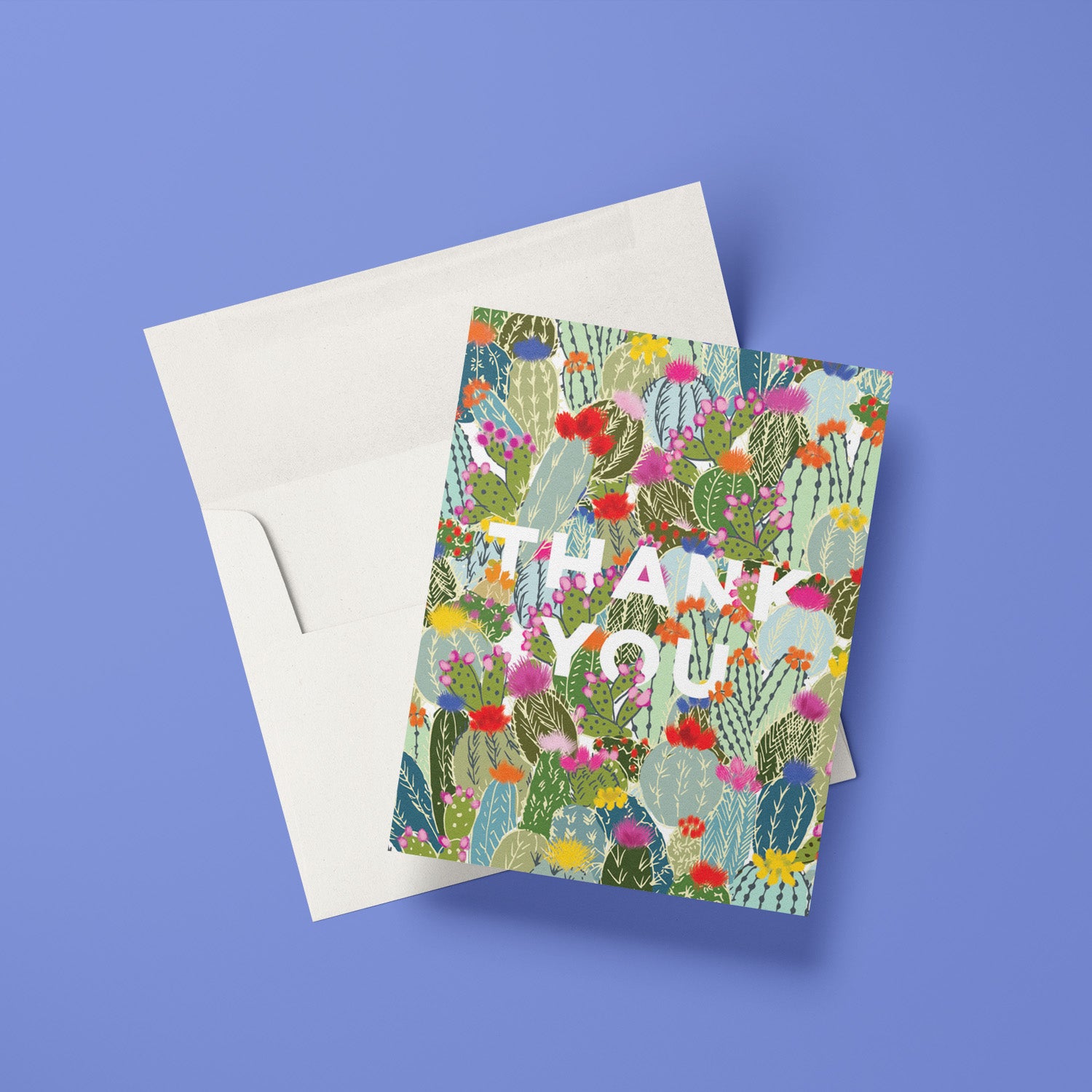 Thank you card with multiple colorful cactus illustrations in a lively pattern and bold type face