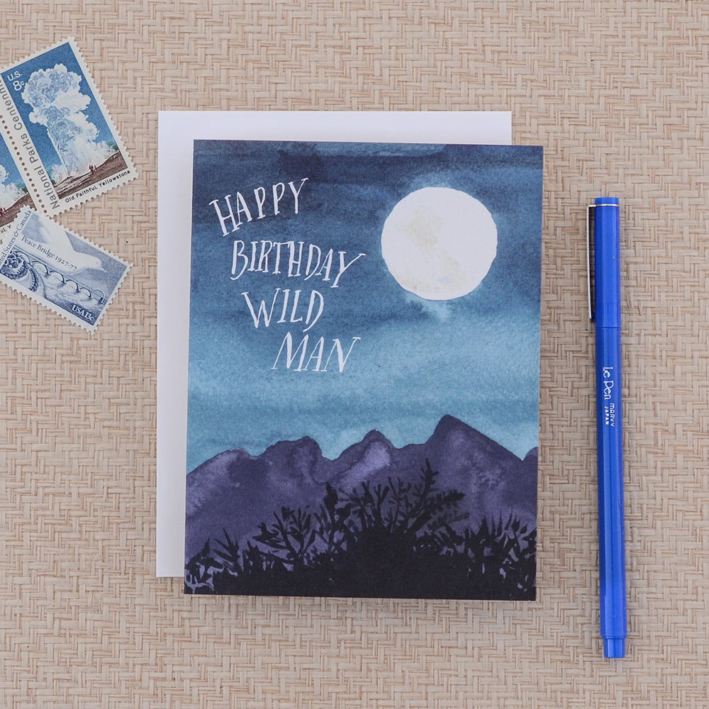 Rugged birthday card with elements of the wilderness, featuring mountains, and a full moon, perfect for an outdoors enthusiast.