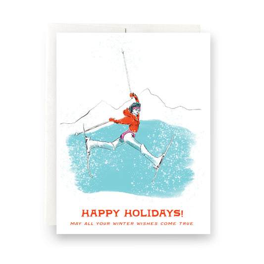 Winter Wishes holiday card featuring a ski babe on a mountain scape, sending warm wishes during the cold season, blank inside.