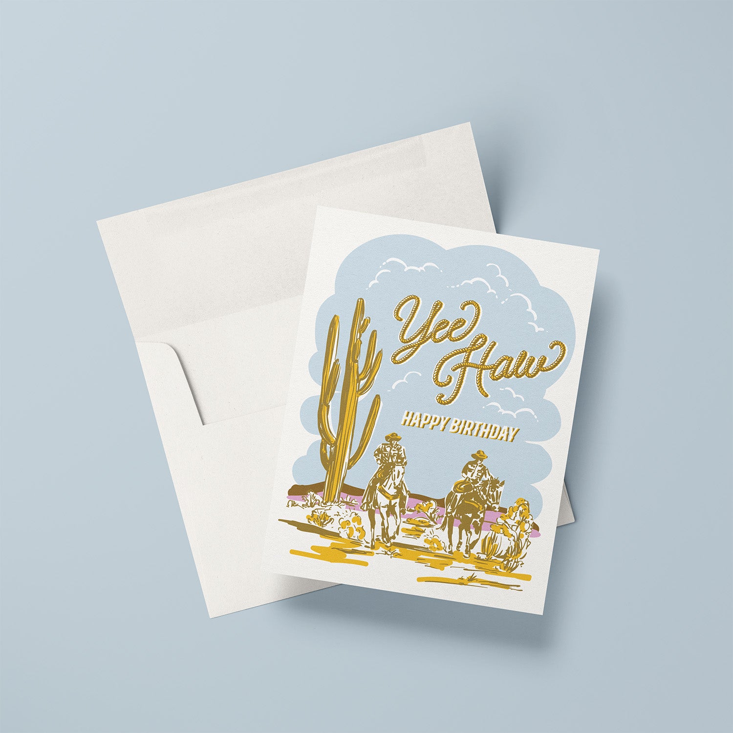 Western-themed birthday card with 'Yee Haw' text, two cowboys on horseback, cactus, and desert scene.