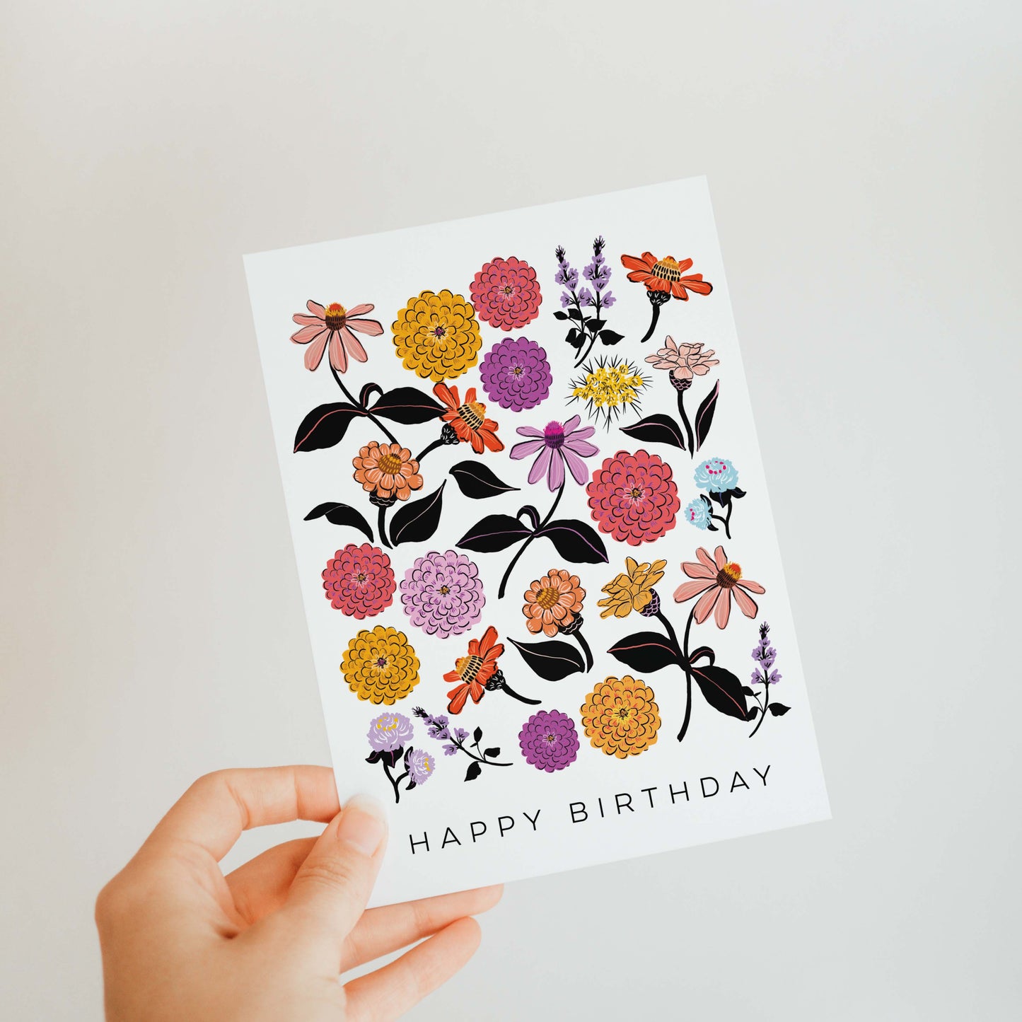 Bright and cheerful birthday card featuring illustrations of colorful zinnias, celebrating the beauty of flowers and perfect for garden lovers.