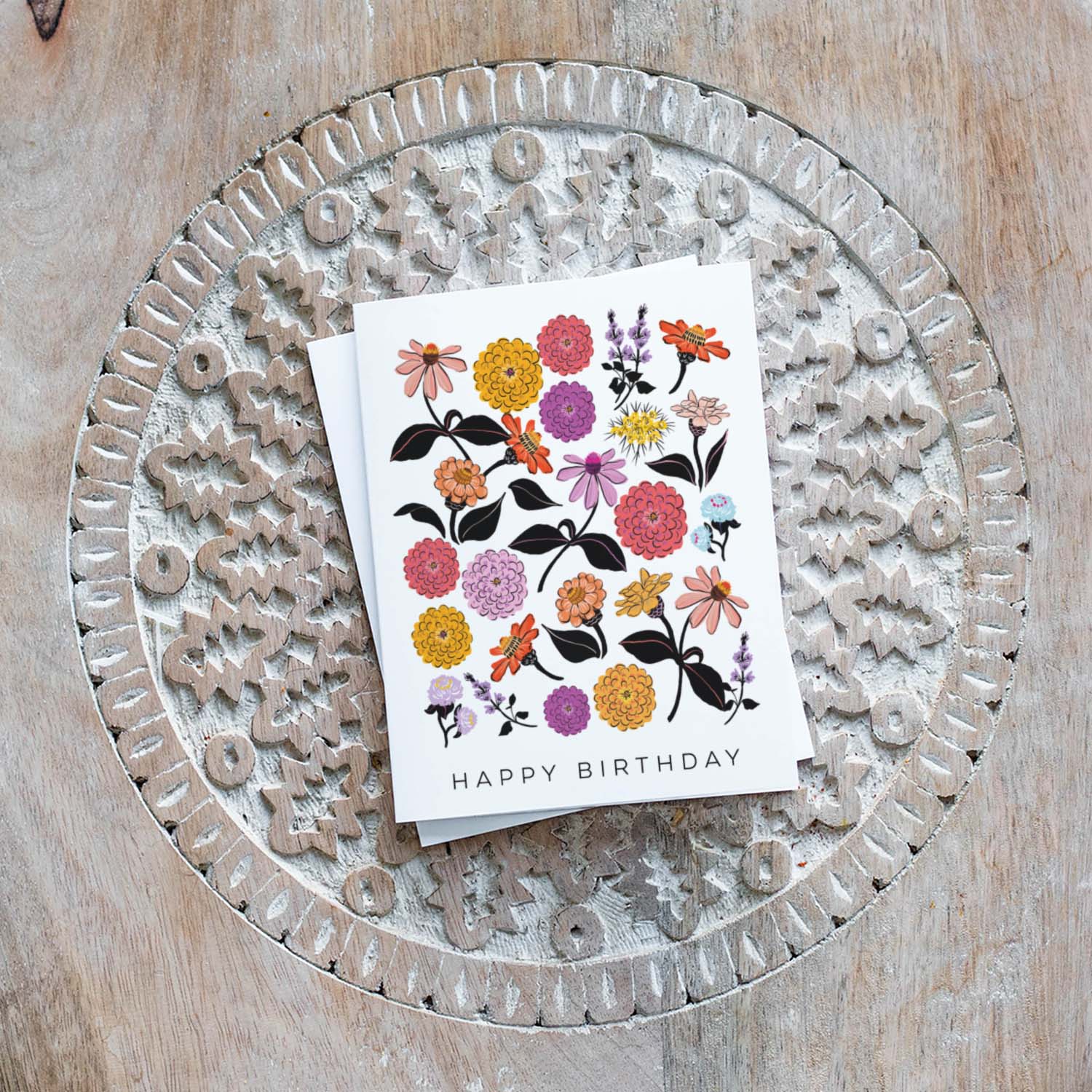 Bright and cheerful birthday card featuring illustrations of colorful zinnias, celebrating the beauty of flowers and perfect for garden lovers.